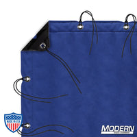 Chromakey blue screen with webbing, grommets, ties, and elastic corners for film grip rigging, including storage bag.