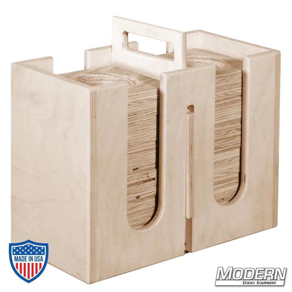 Wooden cup block carrier with handle and 12 cup blocks for film grip and rigging use.