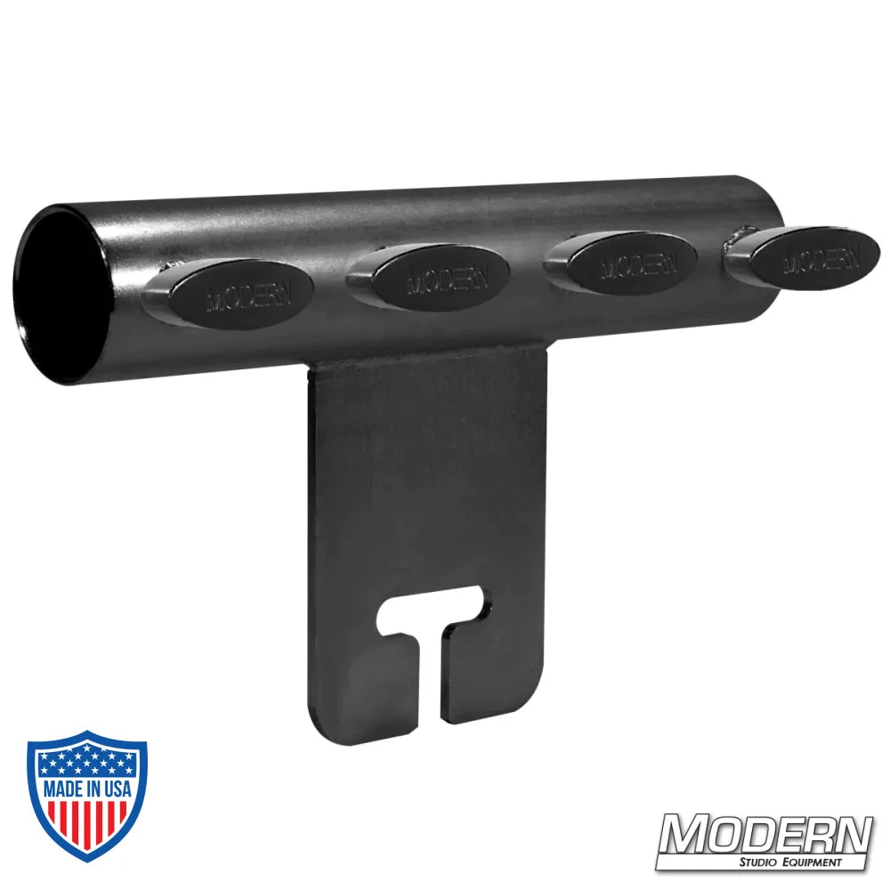 Black zinc adapter for attaching 1-1/2" Speed-Rail to grip head in film rigging setups, featuring T-handles for secure connection
