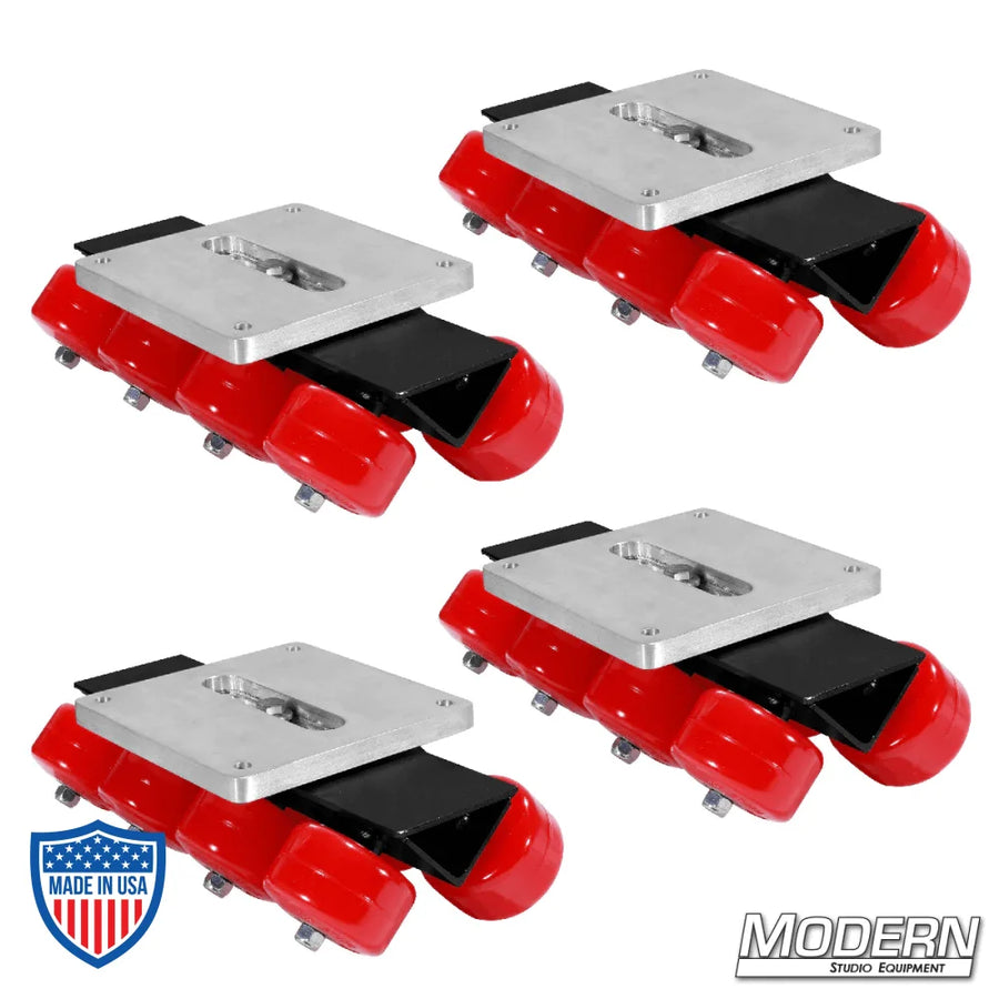Set of four black zinc skateboard brackets with eight red wheels each, ideal for film grip rigging applications.