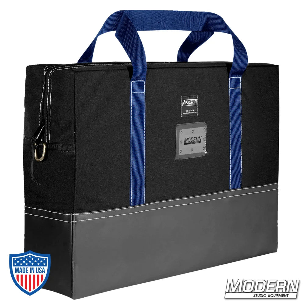 Black Cordura carrying bag with blue handles, vinyl bottom, and heavy duty zipper by Modern Studio Equipment for film grip rigging.