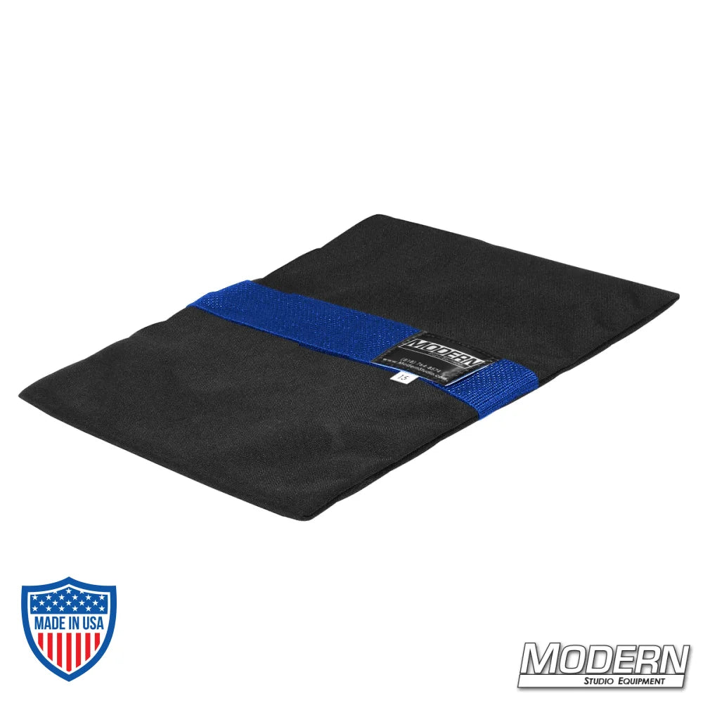 Flyaway Sandbag 15 lbs made with durable Cordura 1000 for film grip and rigging, featuring a blue velcro closure for easy use.