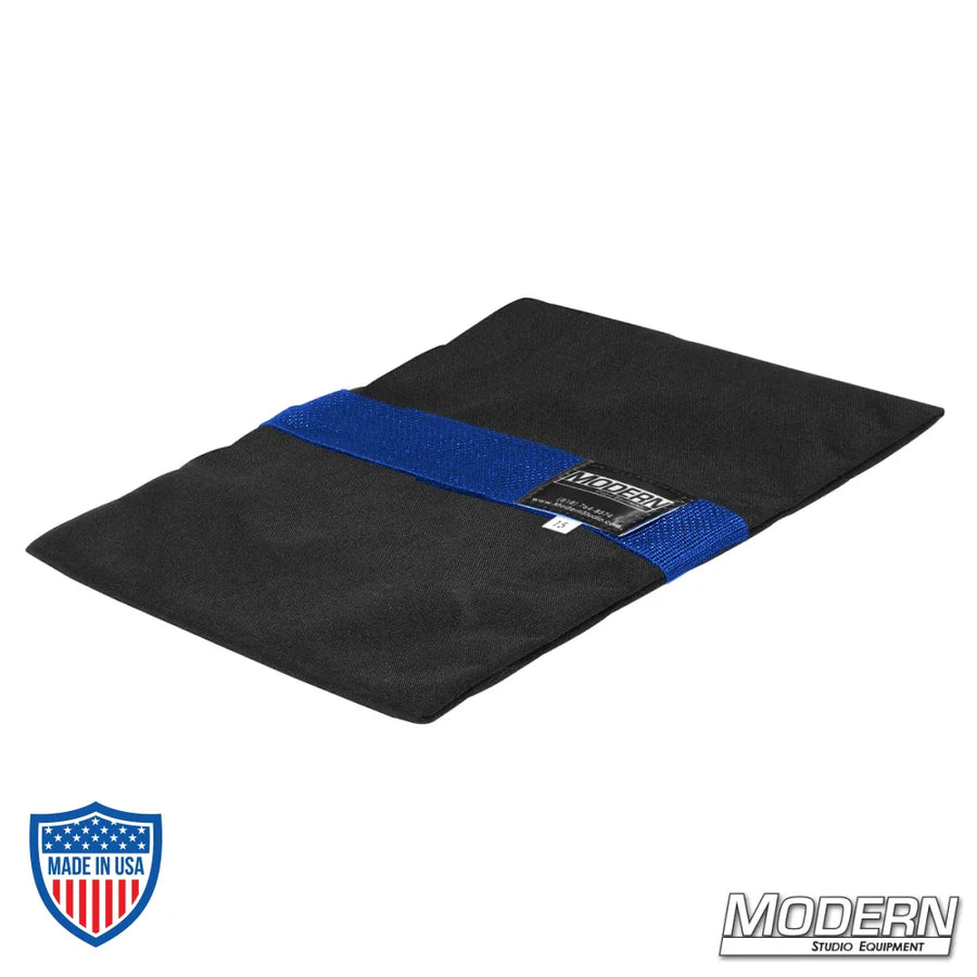 Flyaway Sandbag 15 lbs made with durable Cordura 1000 for film grip and rigging, featuring a blue velcro closure for easy use.