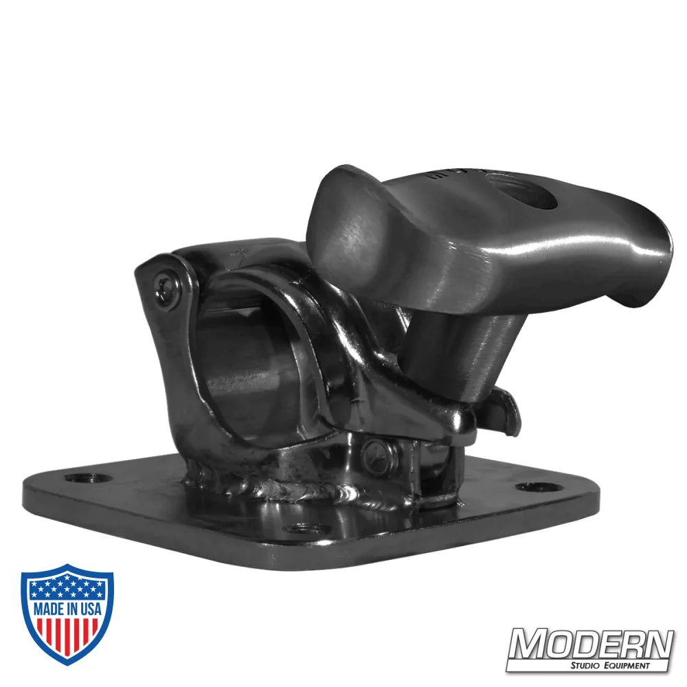 Black zinc grid clamp with 4" x 4-1/2" flat plate and spin handle, ideal for film grip rigging with 1-1/4" or 1-1/2" aluminum Speed-Rail®.