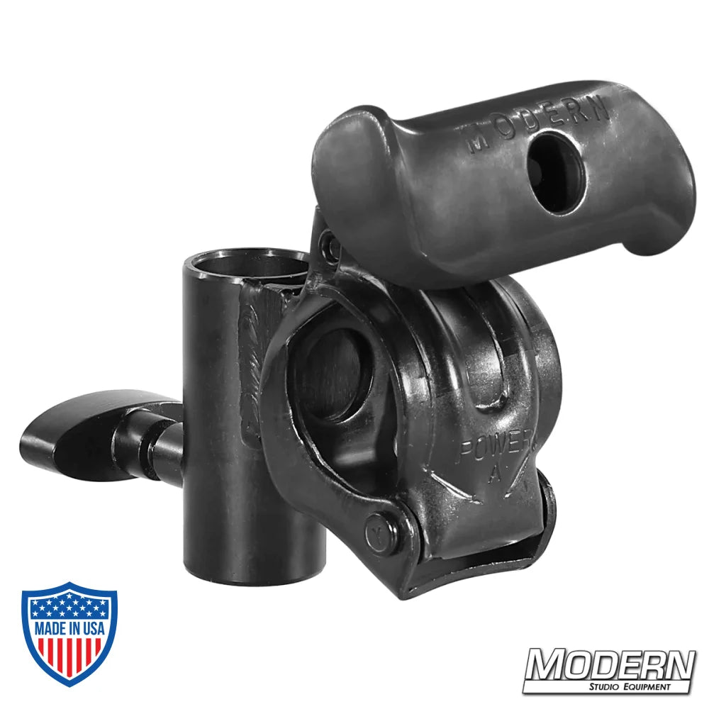 Black zinc grid clamp with cross-style junior receiver and spin handle for film grip and rigging by Modern Studio Equipment.