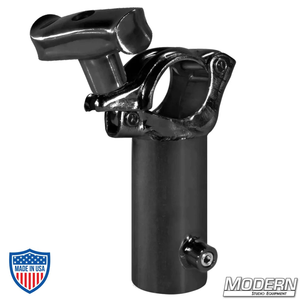 Steel grid clamp with vertical 1-1/4" Speed-Rail receiver, black zinc finish and spin handle for film grip rigging.