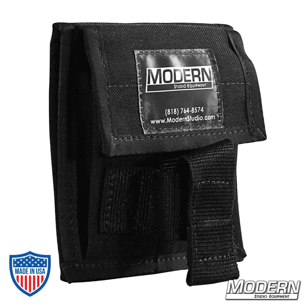 Hammer and nail holder with Velcro safety strap, perfect for film grip rigging, by Modern Studio Equipment.