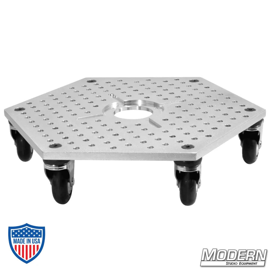 Hex Plate Floor Dolly with casters for film grip and rigging applications, featuring a low-profile aluminum design and a standard mitchell receiver in the center