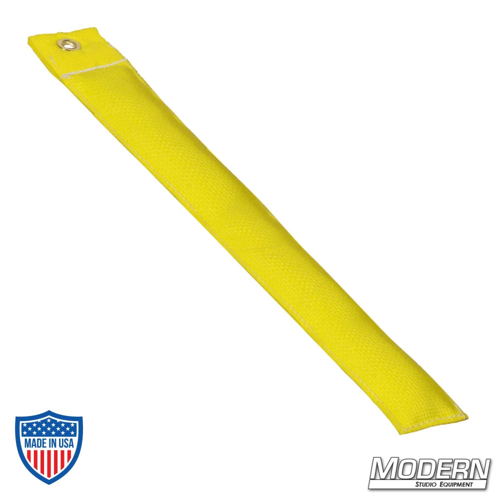 Modern's 12" yellow marker made of Cordura 1000 for film grip rigging, durable and weighted to stay in position.