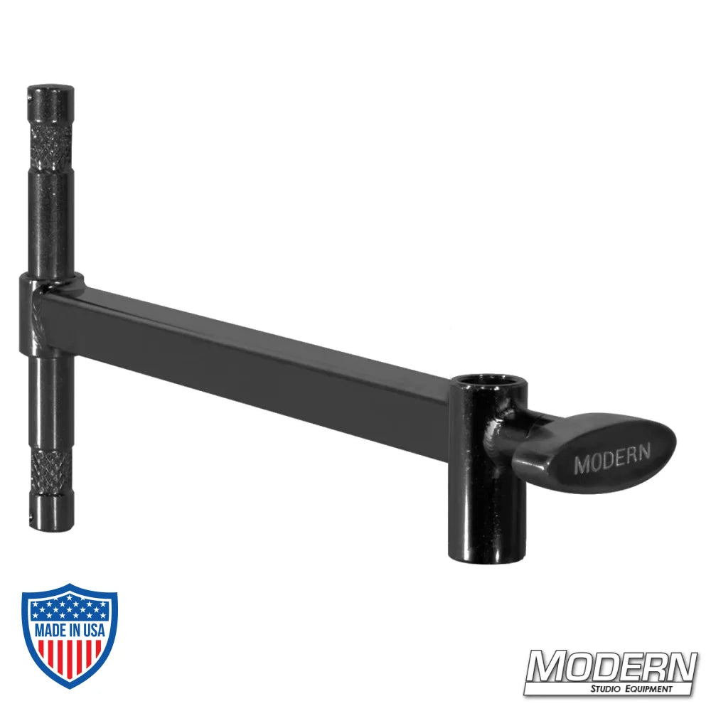 Mini Baby Offset Arm in black zinc finish, 7" with male 5/8" pin and female receiver for film grip rigging.