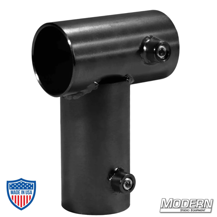 Black zinc Mini Corner for 1-1/2" Speed-Rail® with set screws, used for film grip rigging to create a 90° corner on aluminum frames.