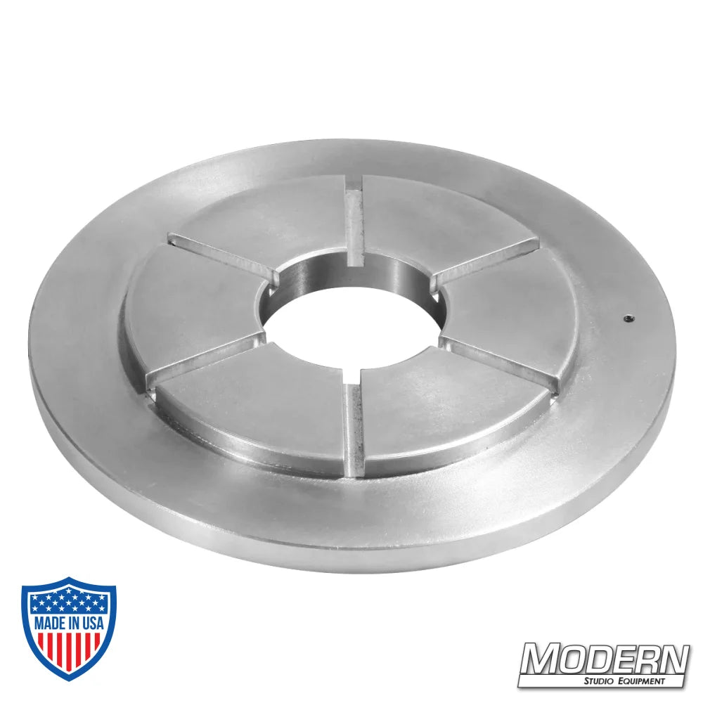 Mitchell to Sachtler Adapter for film grip rigging equipment.