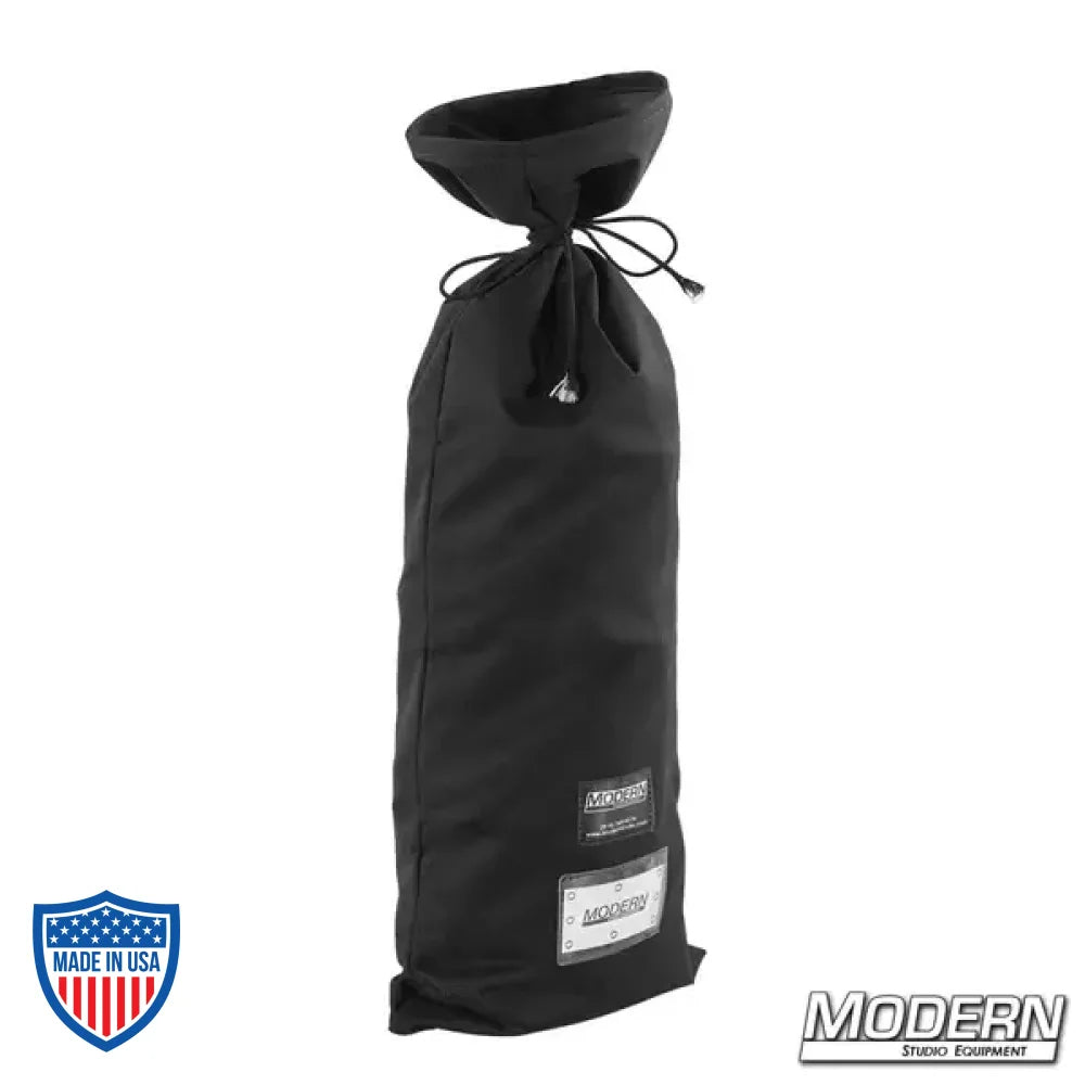 Black storage bag for film grip rigging 12' x 12' Natural Bounce muslin, featuring webbing, grommets, and ties along all sides.
