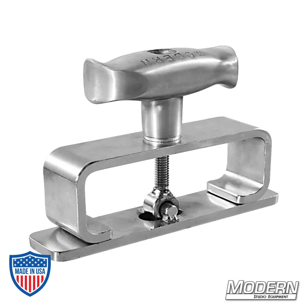 Steel Nerd Clamp for mounting wooden hi-hats to double-sided step ladders, ideal for film grip and rigging equipment setup.