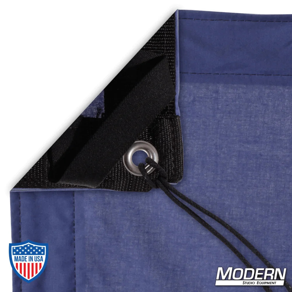 Night Blue Muslin textile for film rigging with webbing, grommet, and tie showing on the corner.