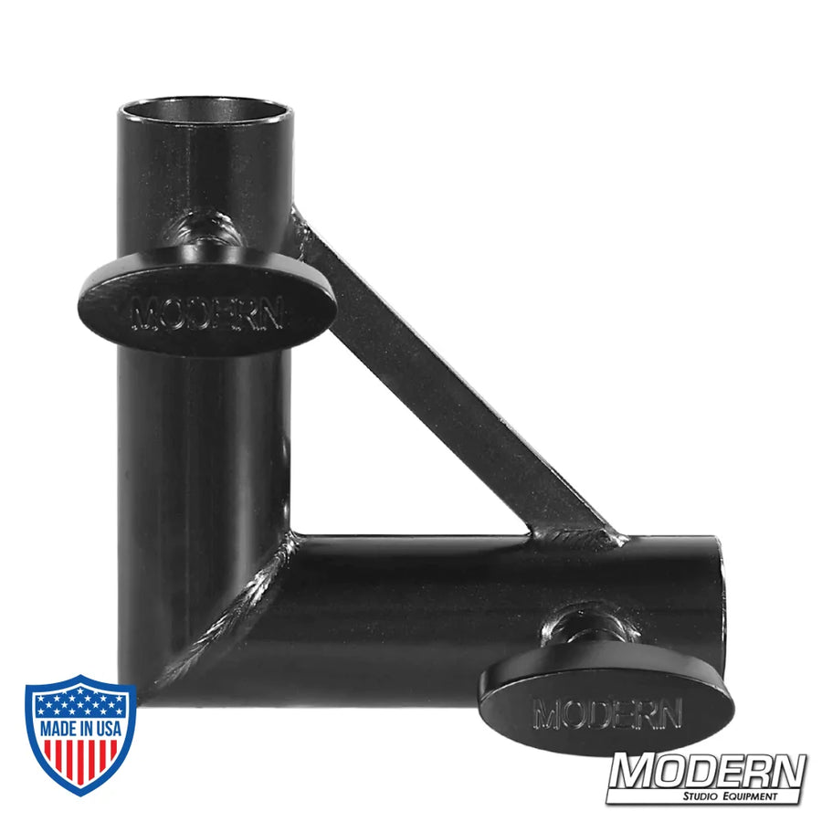 Pipe corner fitting for 1" round pipe with black zinc finish and T-handles, used for film grip and rigging.