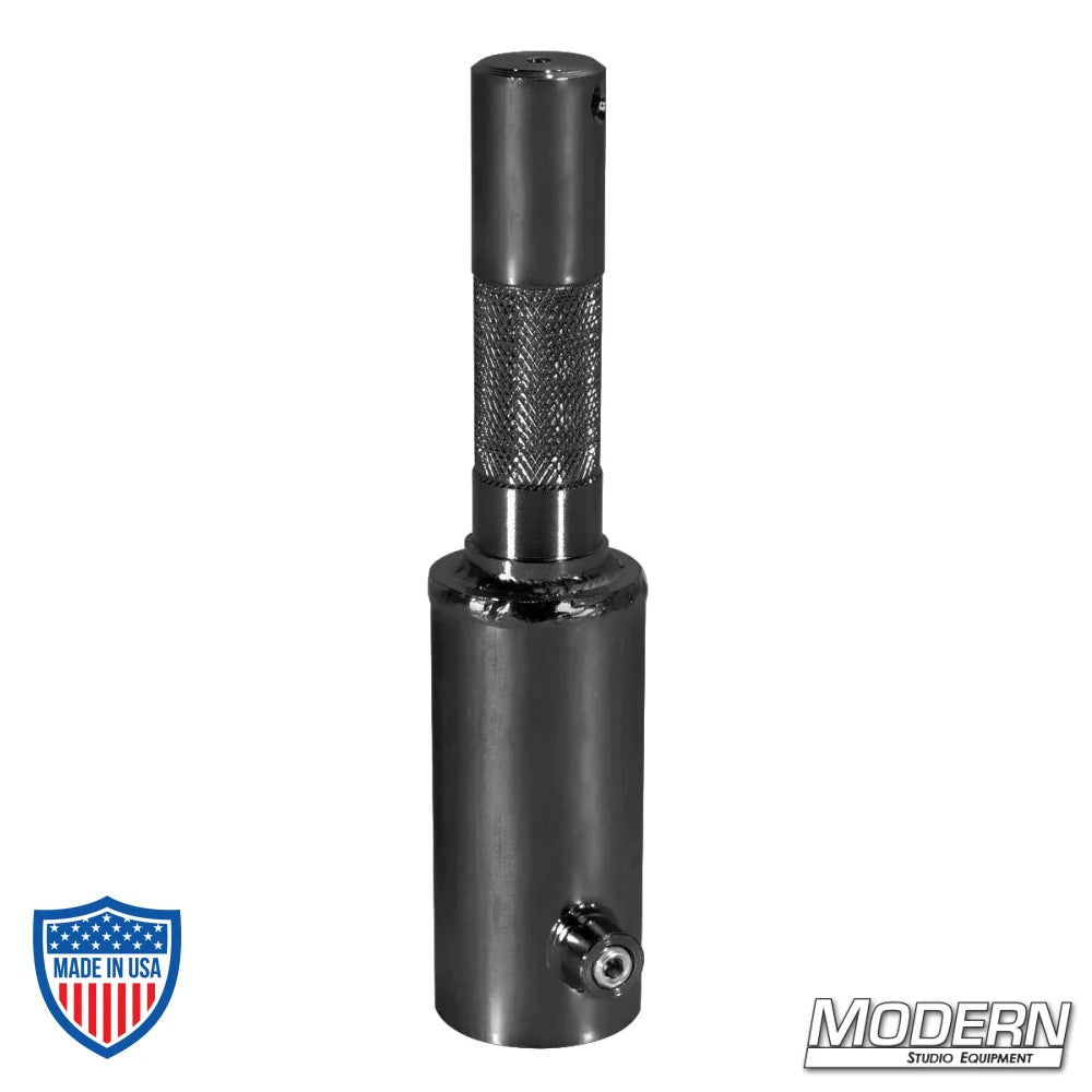 Black Zinc Pipe Receiver to Junior Male for 1-1/4" Speed-Rail, film grip rigging accessory.