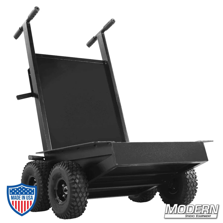 Studio cart with four 10" wheels for film grip and rigging, holds cables, sandbags, lamps, crates, and boxes, equipped with hand brake.