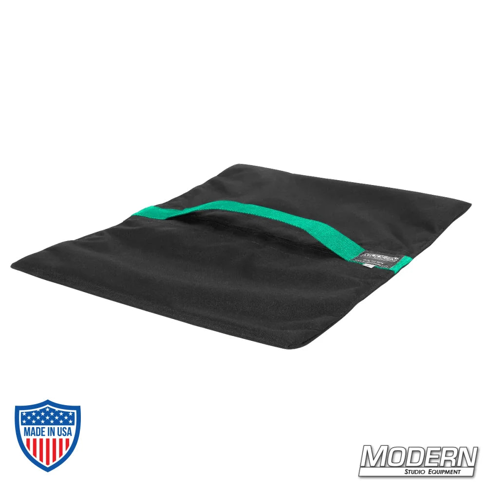 35-lb Flyaway Sandbag in black Cordura 1000 with velcro closure for film grip rigging, shown empty, no silica sand included