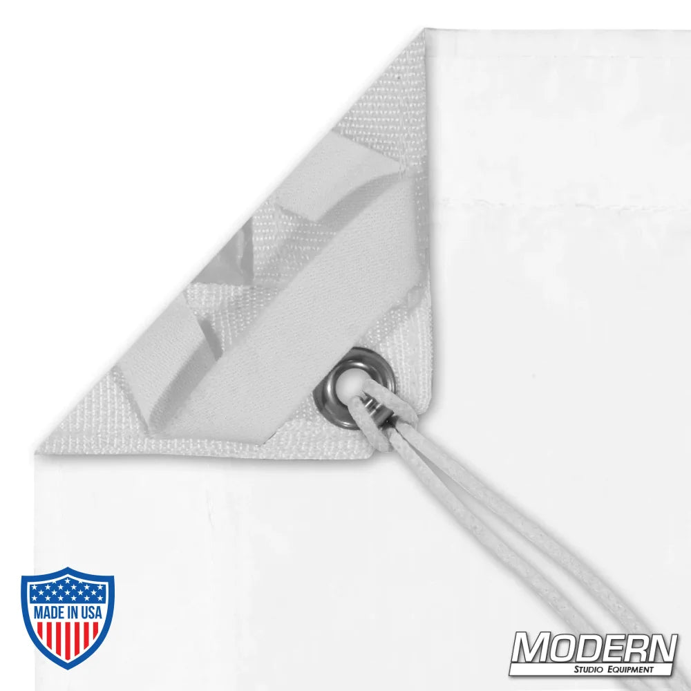 Close-up of Silent Full Grid Cloth corner with grommet and tie for film grip rigging, includes storage bag.