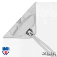 Close-up of Silent Full Grid Cloth corner with grommet and tie for film grip rigging, includes storage bag.