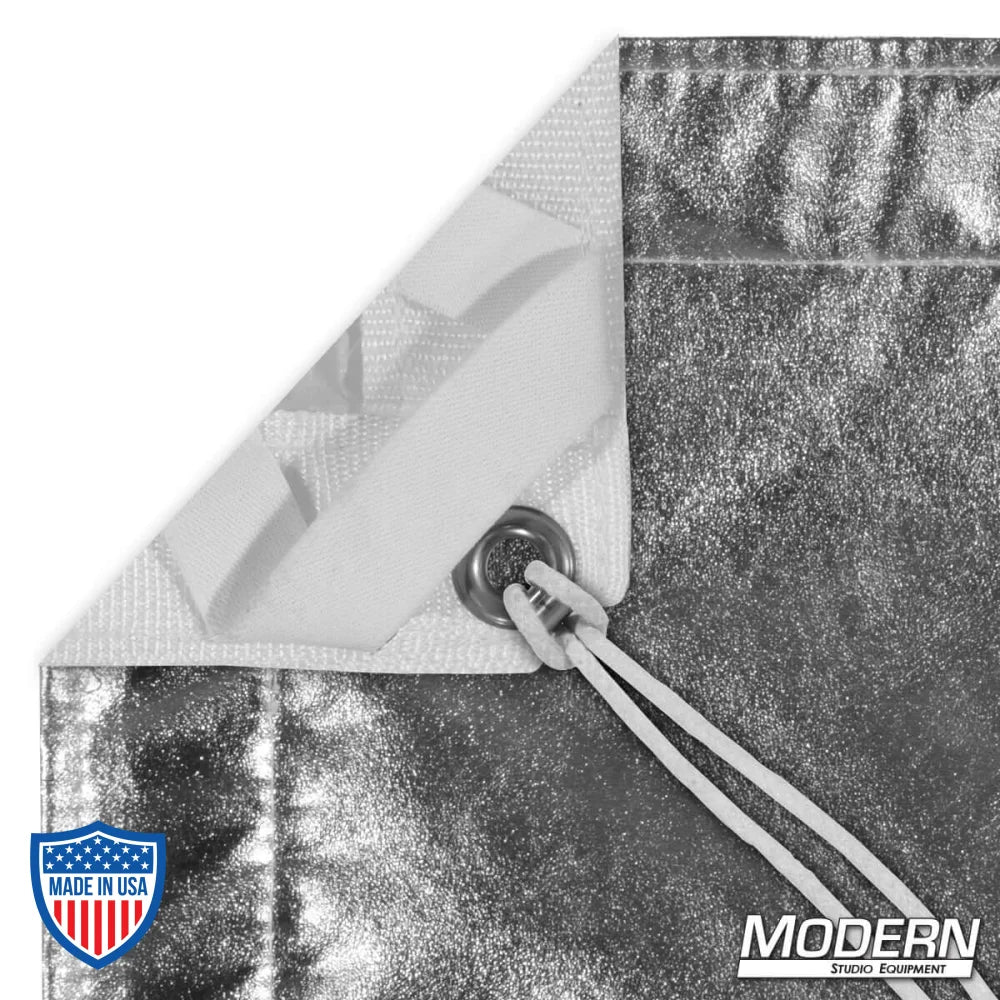 Silver/White Lame slip-on textile with grommet, ties, and elastic, ideal for film grip and rigging. Comes with labeled storage bag.