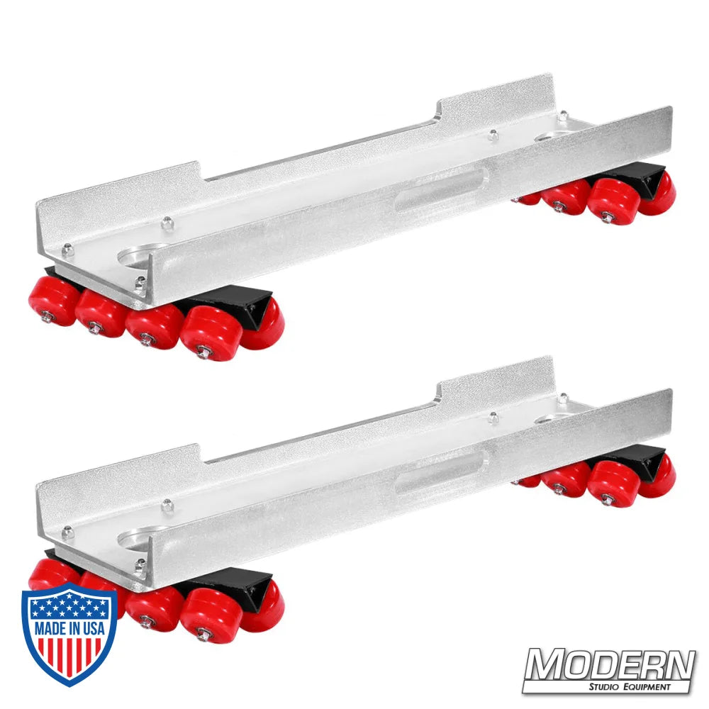 Skateboard dolly complete with channels and 32 red soft durometer wheels for film grip and rigging use on track.