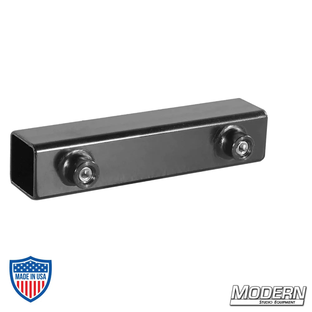 Sleeve for 1" square tube in black zinc with set screws for film grip rigging.