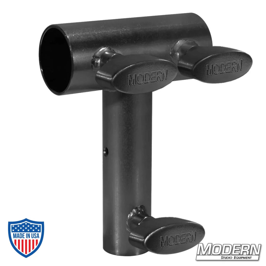 Black zinc slider with junior female fitting and T-handles for 1-1/4" Speed-Rail, used in film grip and rigging applications.