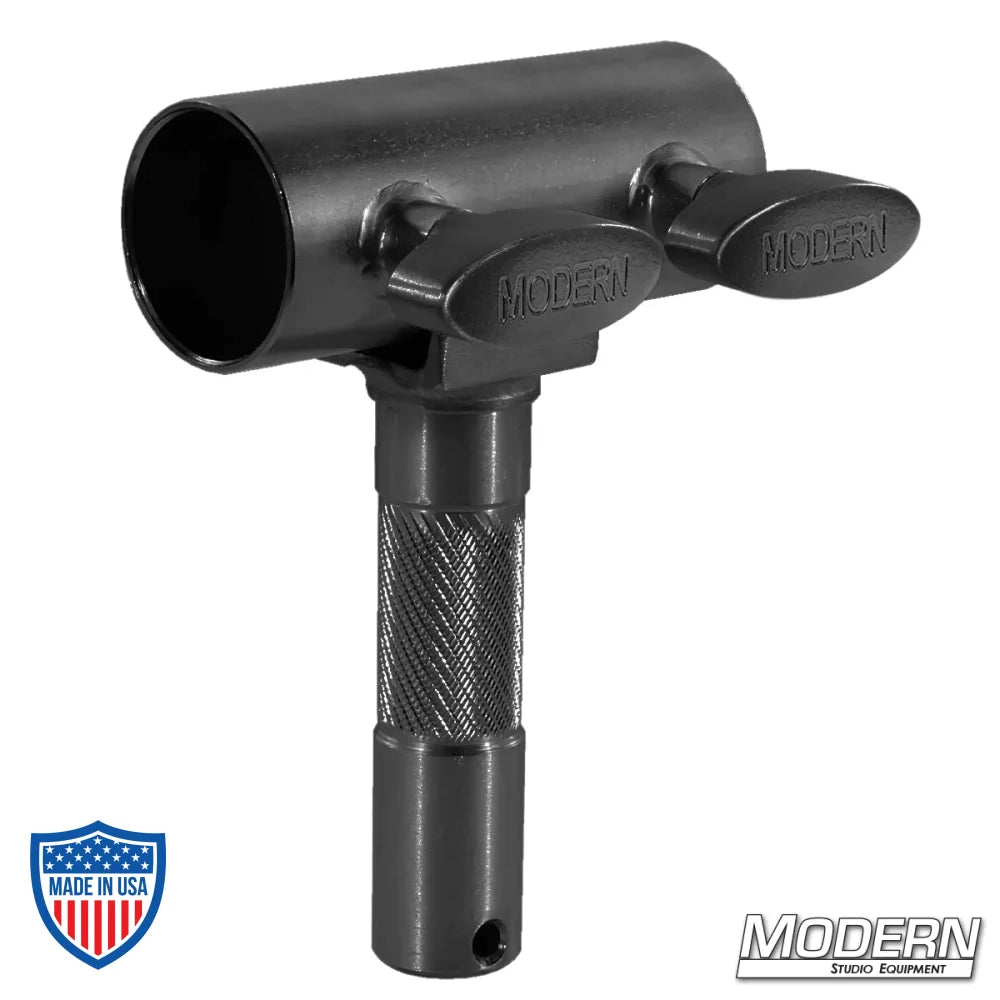 Black zinc slider with T-handles for 1-1/4" Speed-Rail® fitting for film grip and rigging.