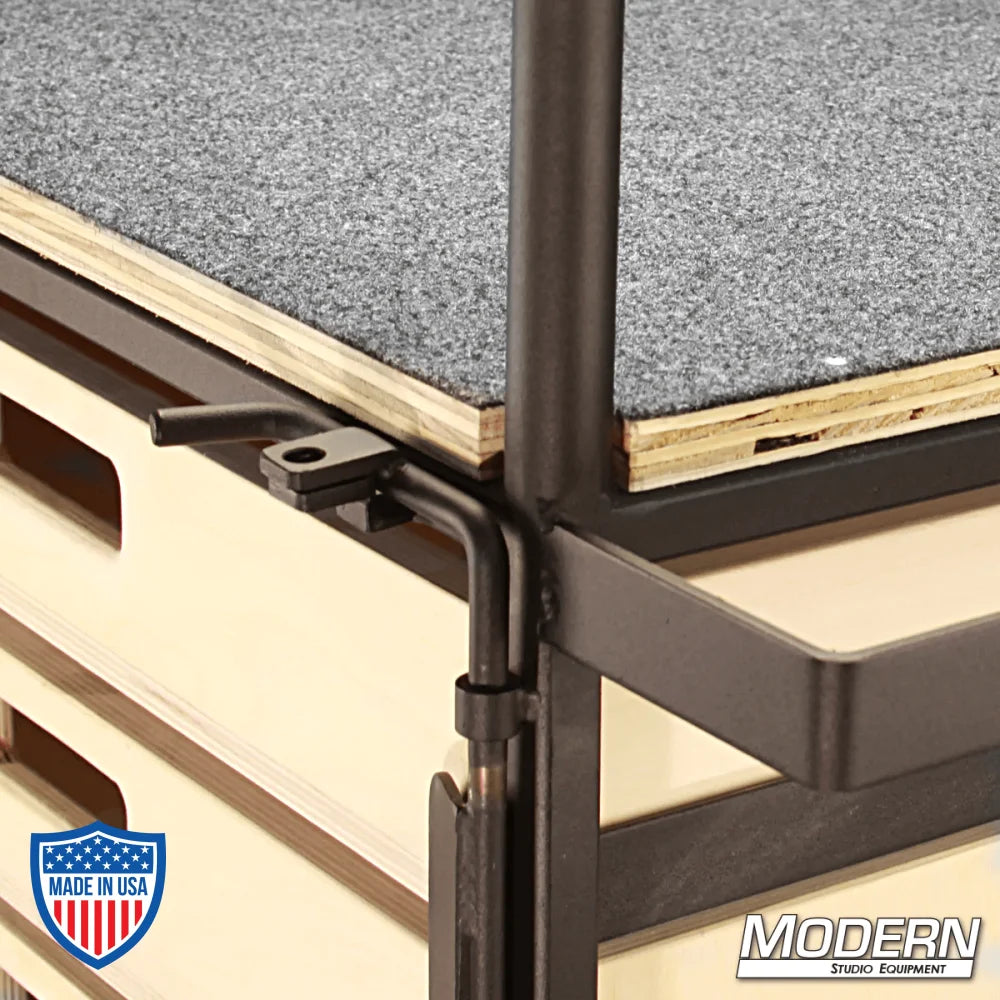 Small steel grip cart with wooden drawers for film rigging, featuring fixed carefree casters and swivel casters with brake.