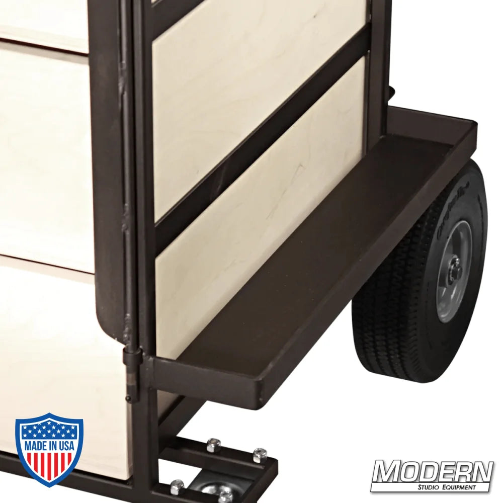 Small grip cart with 6 wooden drawers and steel frame, featuring 2 fixed rear casters and 2 front swivel casters with brake for film rigging