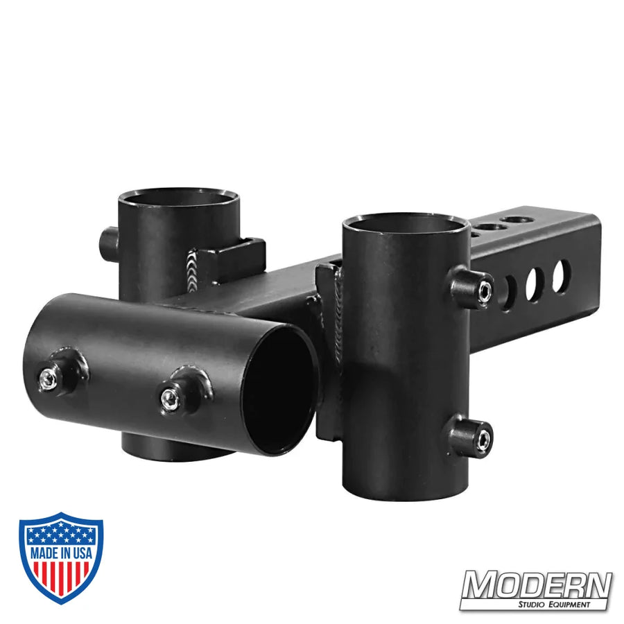 Small black zinc trailer hitch adapter for 1-1/4" Speed-Rail with multiple rigging options for film grip equipment.