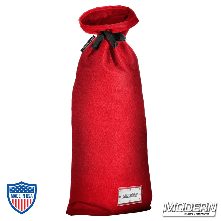 Large red storage bag with nylon cord for film grip rigging, featuring a plastic sleeve for labeling and branded by Modern Studio Equipment.