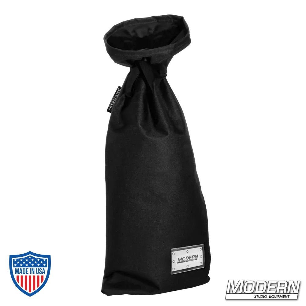 Medium black storage bag with nylon cord for secure tying, ideal for film, grip, and rigging use. Features a plastic sleeve for labeling.
