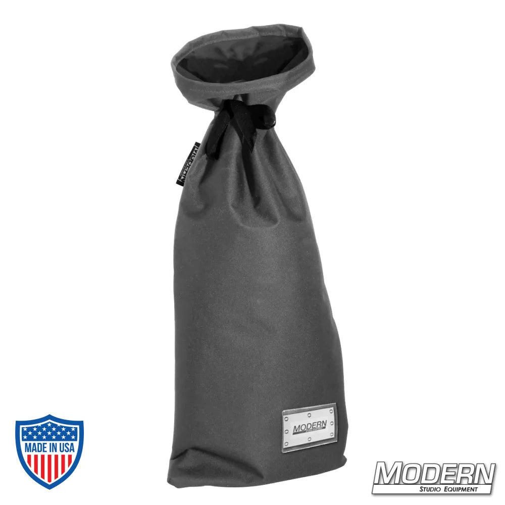Medium storage bag with nylon cord for easy tying and plastic sleeve for labeling, ideal for film grip and rigging equipment.