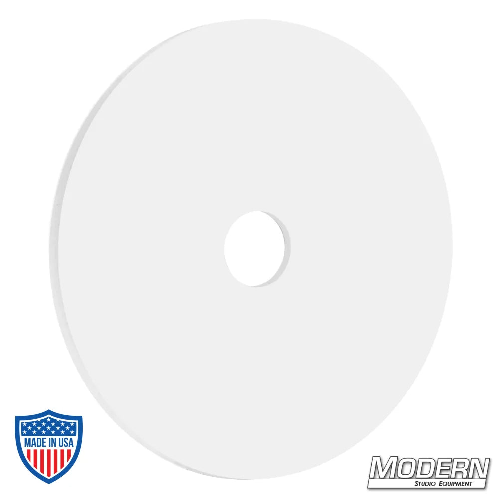 3-1/2" Teflon washer with a 1/2" hole, ideal for skateboard dolly in film rigging and grip applications.
