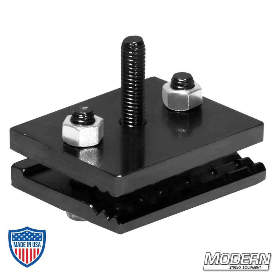 Uni-body pinch clamp with 3/8" male thread in black zinc for film rigging and grip equipment.