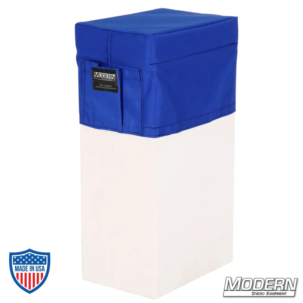 Vertical Apple Box Seat Cover with Pocket in blue Cordura fabric for film grip and rigging, adding comfort and durability on set.