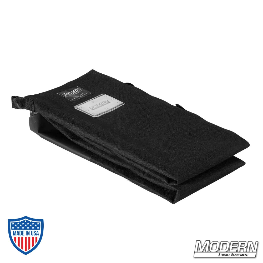 Black Cordura 1000 Wag Flag Bag with rubber handle and vinyl bottom, holds three 8' flags, for film grip and rigging equipment.