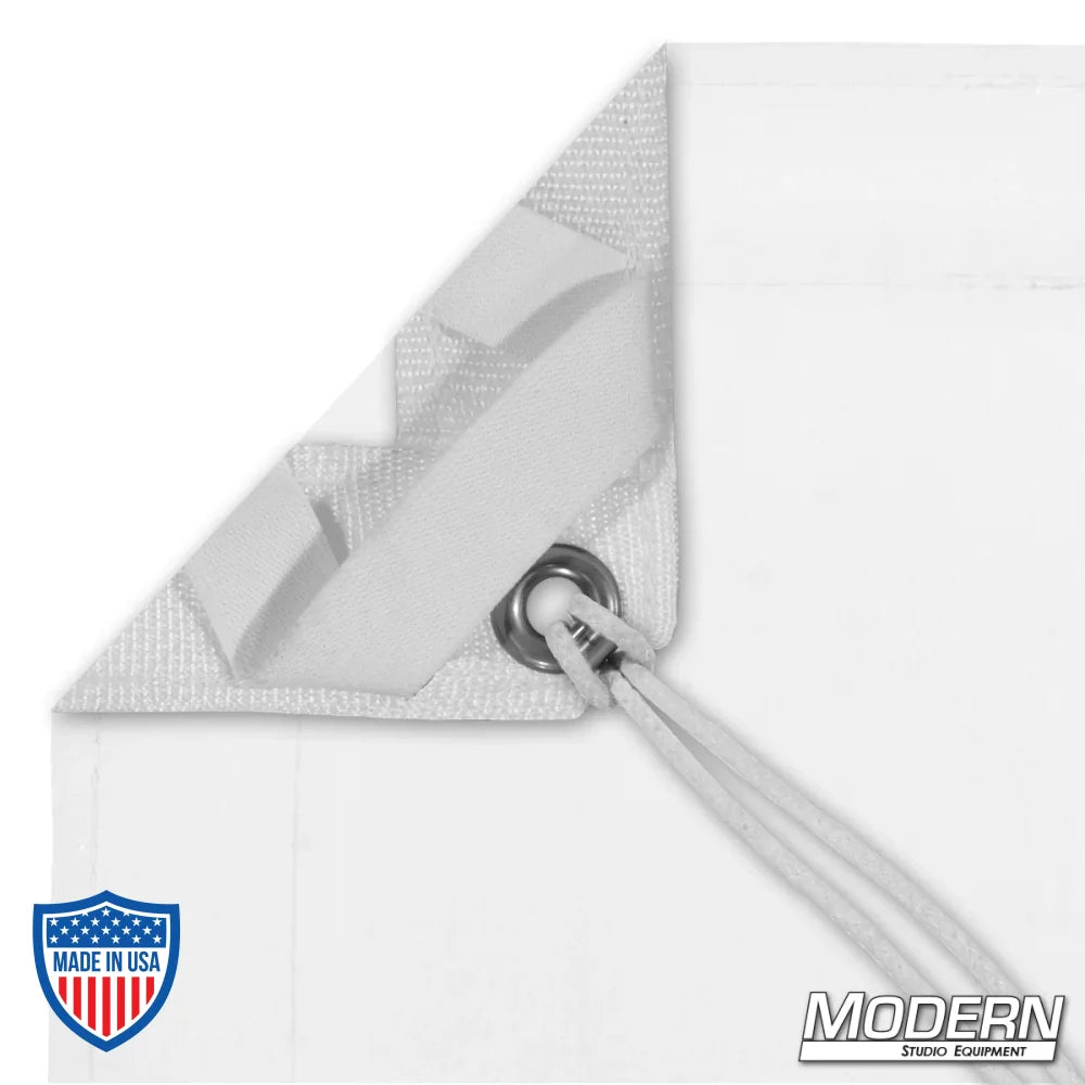 White Artificial 1/4 Stop Silk with webbing, grommets, and ties for film grip and rigging, comes with labeled storage bag.