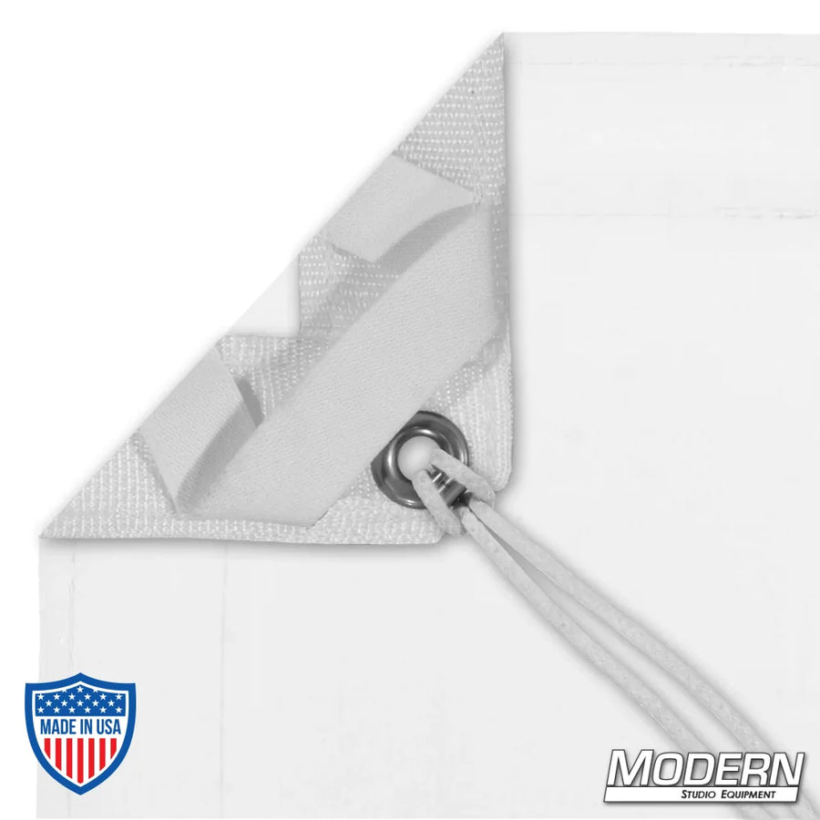 White Artificial 1/4 Stop Silk with webbing, grommets, and ties for film grip and rigging, comes with labeled storage bag.