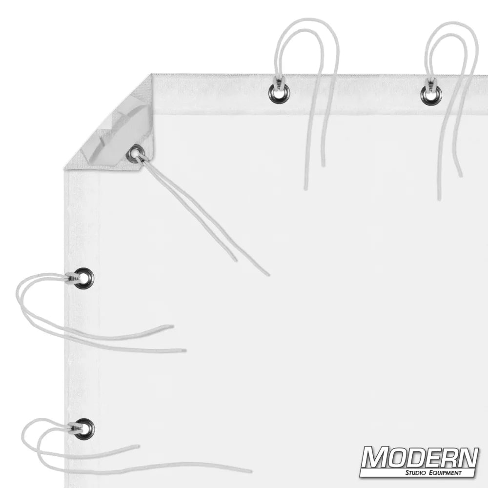 White single scrim with webbing, grommets, and ties for film grip rigging, featuring elastic corners and labeled storage bag.