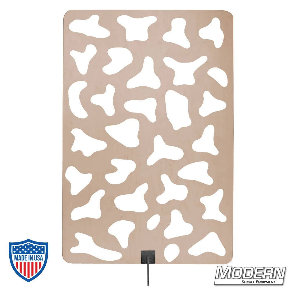 Wood cucoloris with frame for film grip rigging, creates unique shadow patterns on backgrounds or subjects.