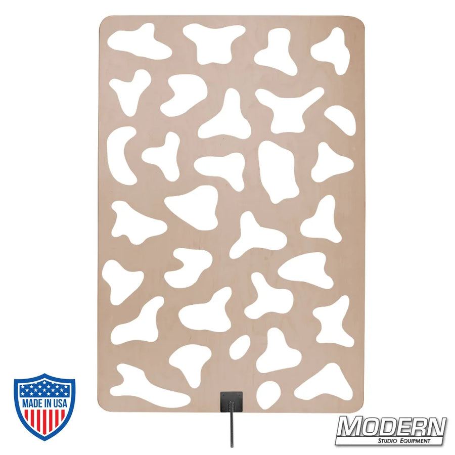 Wood cucoloris with frame for film grip rigging, creates unique shadow patterns on backgrounds or subjects.