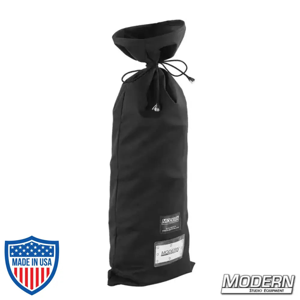 Black storage bag for film grip rigging 12' x 12' Natural Bounce muslin, featuring webbing, grommets, and ties along all sides.