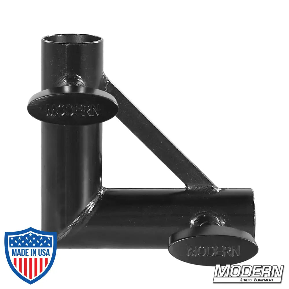 Pipe corner fitting for 1-inch round pipe with black zinc finish and T-handles, used for film grip and rigging.