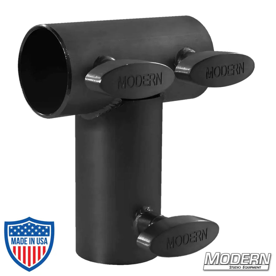 Black zinc pipe tee receiver with T-handles for 1-1/2-inch Speed-Rail®, used in film grip and rigging for additional frame support.