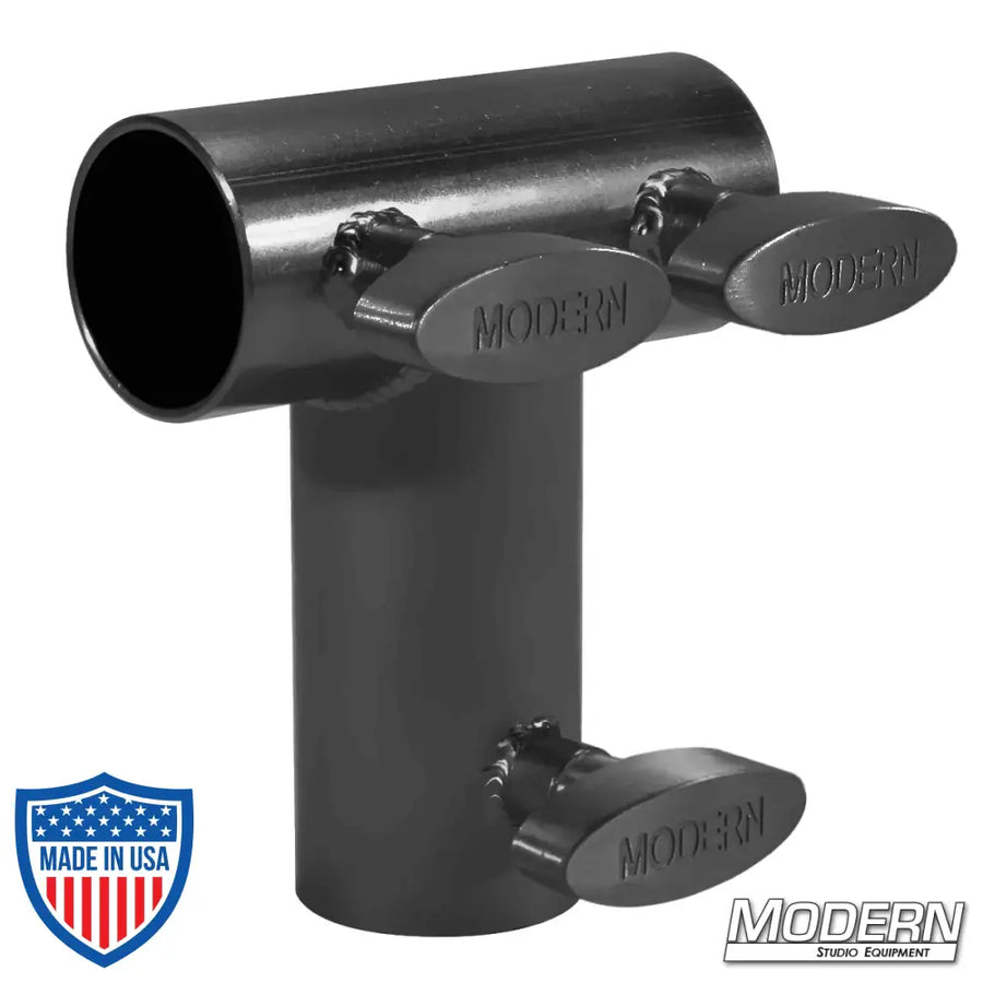 Black zinc Pipe Tee Receiver for 1-1/4-inch Speed-Rail with T-handles used in film grip and rigging for added strength and support.