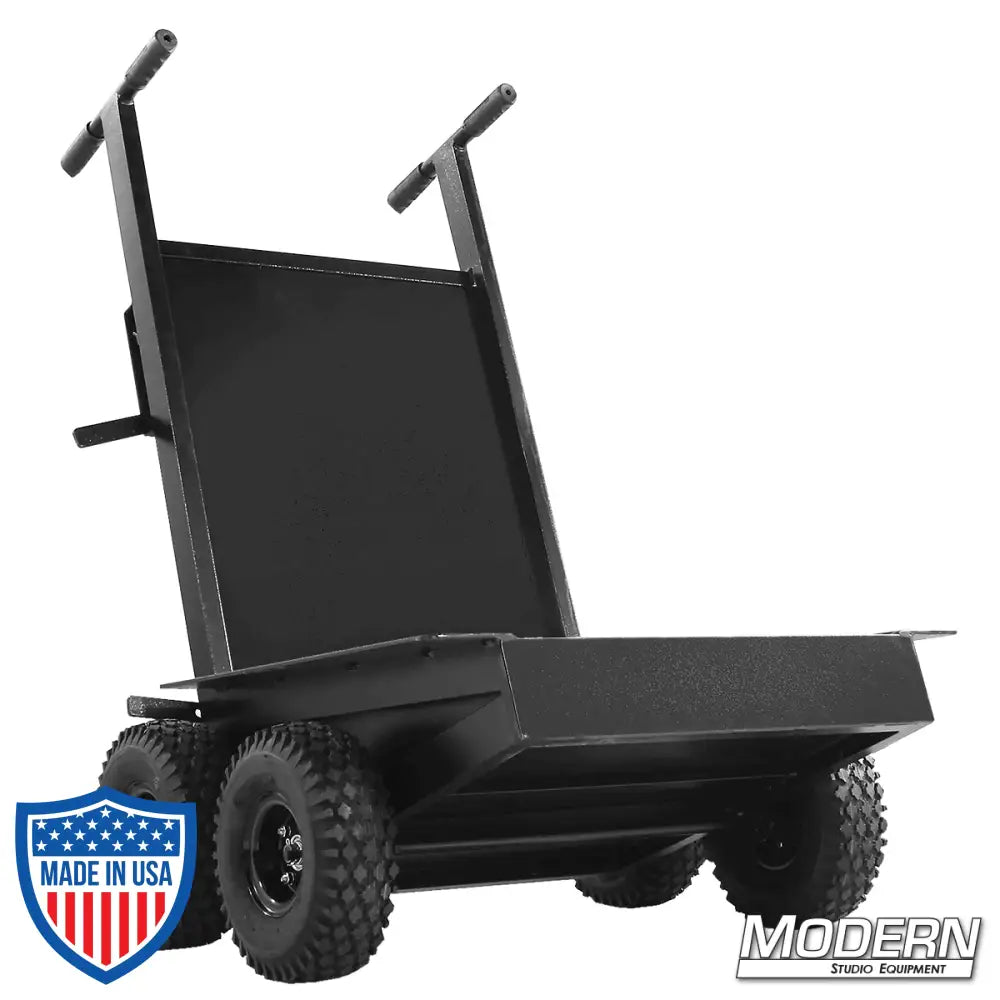 Studio cart with four 10" wheels for film grip and rigging, holds cables, sandbags, lamps, crates, and boxes, equipped with hand brake.